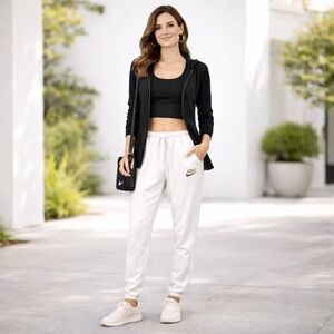 Nike Women's White Cheetah Leopard Swoosh Gold Logo Track Pants Joggers Size XL